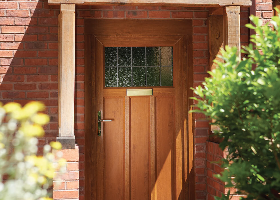 https://stedek.icaal.dev/wp-content/uploads/2018/04/Oak-effect-uPVC-entrance-door.jpg