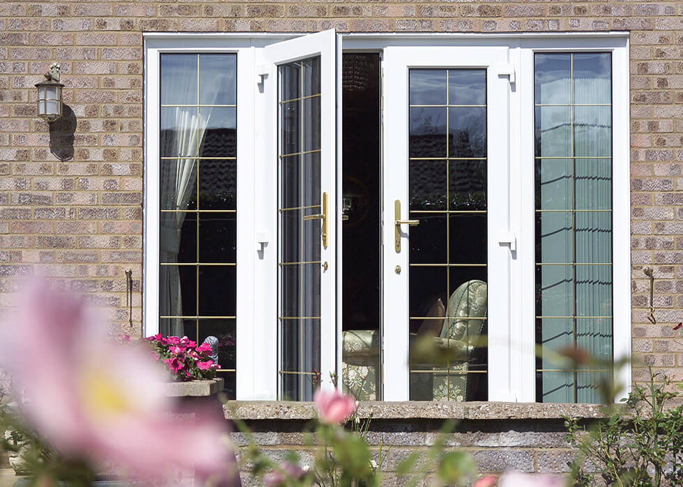 https://stedek.icaal.dev/wp-content/uploads/2018/04/White-uPVC-french-door-with-leaded-glass.jpg